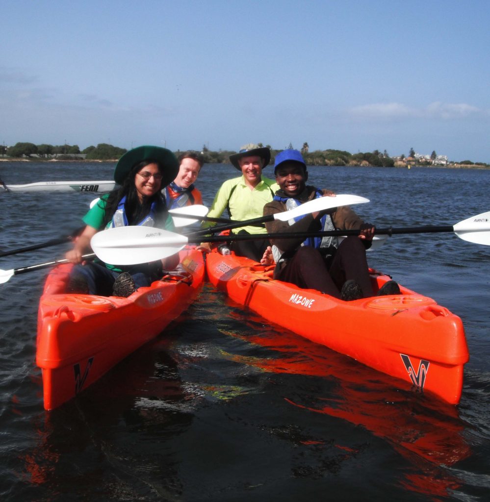 paddle experience - group fo happy paddlers in a paddle fit session.